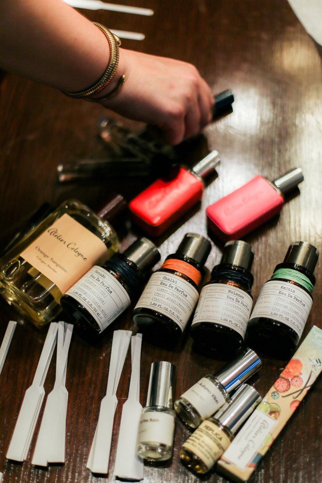 Curated perfume bottles and scent strips